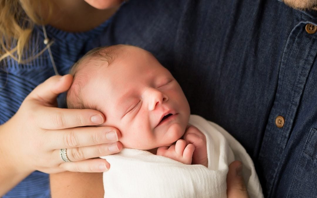 Newborn Photos – A Sleepy, Hockey Loving Baby Boy